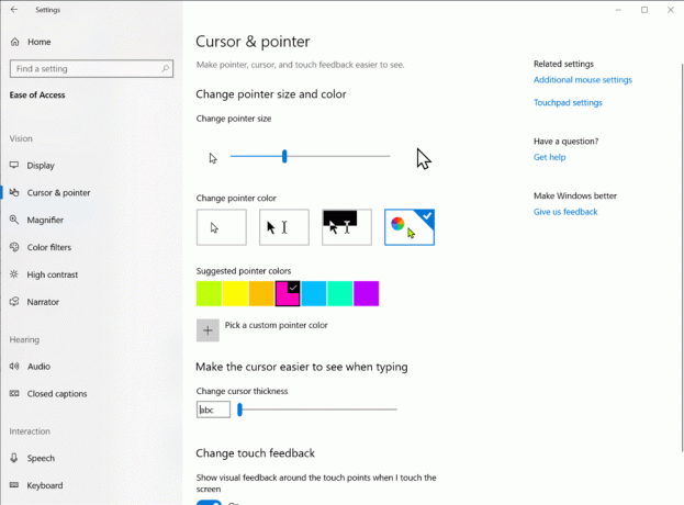 Menampilkan Pengaturan Kursor, dengan opsi untuk membuat kursor Anda berwarna dan lebih besar. Di tangkapan layar, kursor dipilih menjadi besar dan merah muda.