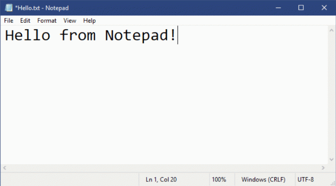 Prikazuje Notepad, s malom zvjezdicom u naslovnoj traci i prikazuje kodiranje u statusnoj traci.